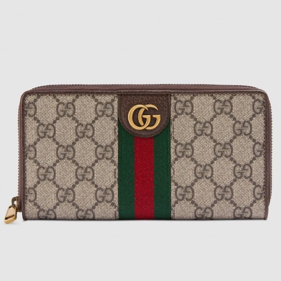 Gucci Handbags - GG double zip around wallet